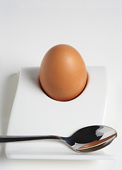 Image showing Brown egg and spoon