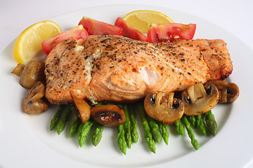 Image showing Pan fried salmon, asparagus and mushrooms