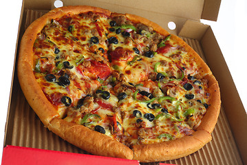 Image showing Whole pizza in a box