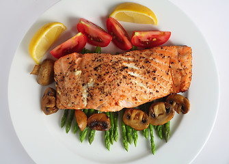 Image showing Salmon steak and asparagus from above