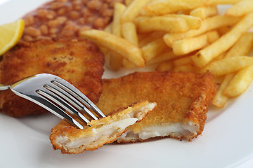 Image showing Breaded fish on a fork