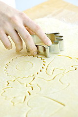 Image showing Cookie cutter and dough