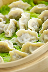 Image showing Bamboo steamer with dumplings