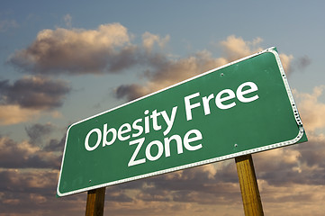 Image showing Obesity Free Zone Green Road Sign and Clouds