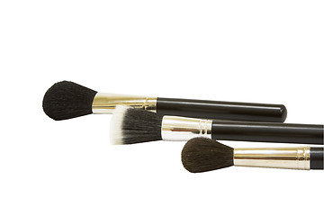 Image showing three make-up brushes 