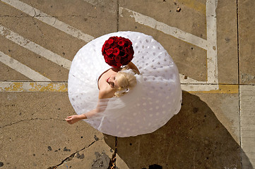 Image showing Bride Twirling in Parking Lot