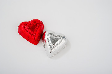 Image showing Two Foil Wrapped Heart Shaped Candies