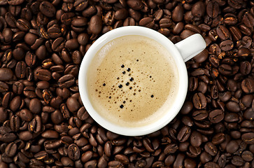 Image showing Cappucino on coffee beans