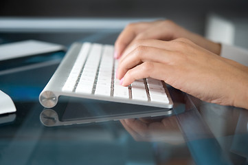 Image showing hands on keyboard