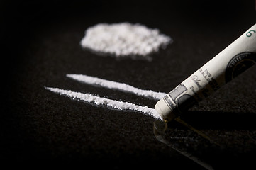 Image showing Lines of Cocaine with rolled bill