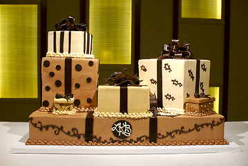 Image showing Unique Multi-Layered Brown and White Wedding Cake