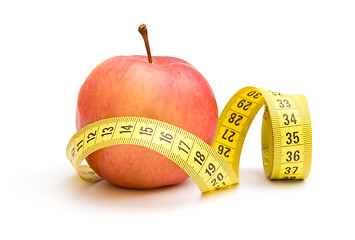 Image showing Red apple and measuring tape