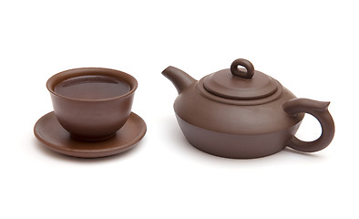 Image showing Cup of tea and teapot