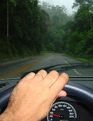 Image showing driving in the middle of a forest