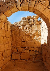 Image showing Ancient stone arch and wall at castle ruin