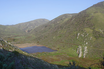 Image showing Landscape with hills and a lake