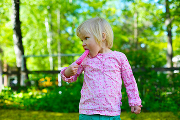 Image showing Little girl with ice-cream