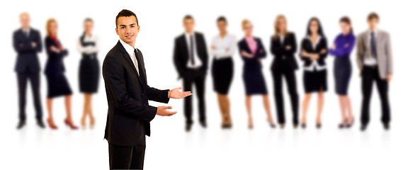 Image showing businessman welcoming to his team