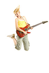 Image showing woman guitarist jumps