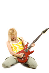 Image showing girl playing an electric guitar