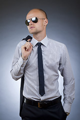 Image showing young businessman looking away