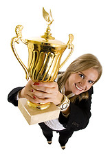 Image showing  businesswoman winning a gold trophy