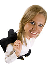 Image showing happy businesswoman with coat on shoulder