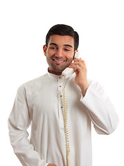 Image showing Middle eastern arab man using the telephone