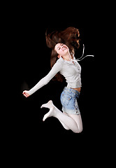 Image showing Young girl jumping