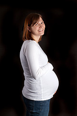 Image showing Happy Pregnant Mommy On Black