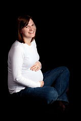 Image showing Sitting Pregnant Mommy On Black