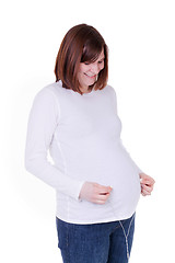 Image showing Mother With Headphones on Belly