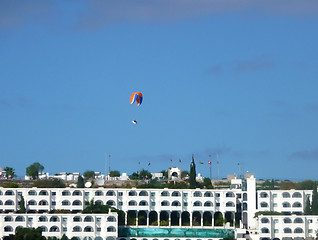 Image showing Parachutist Over Apartments