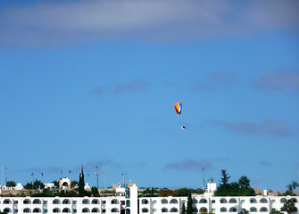 Image showing Parachutist Over Apartments