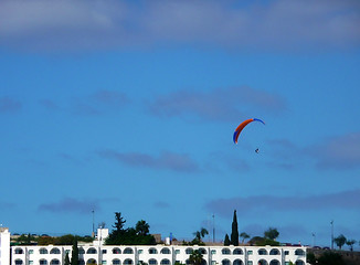 Image showing Parachutist Over Apartments