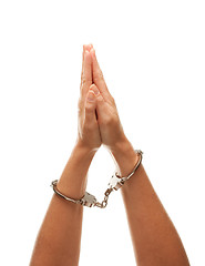 Image showing Handcuffed Woman Raising Hands in Air on White