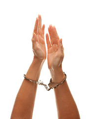 Image showing Handcuffed Woman Raising Hands in Air on White