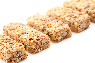 Image showing Row of Several Granola Bars Isolated on White