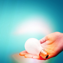 Image showing Background with lit lightbulb