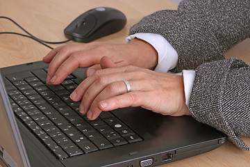 Image showing Typing on a keyboard