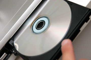 Image showing insert CD on CD player