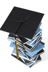 Image showing graduation cap and books