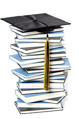 Image showing graduation cap and books