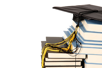 Image showing graduation cap and books