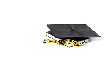 Image showing graduation cap and books