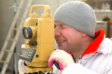 Image showing Land surveyor on construction site