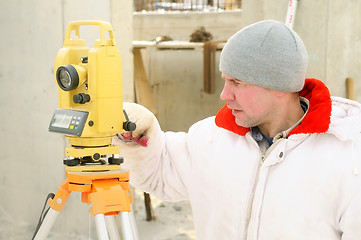 Image showing surveyor worker at construction site