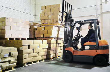 Image showing Forklift loader in warehouse