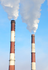 Image showing two smoking chimneys of power plant