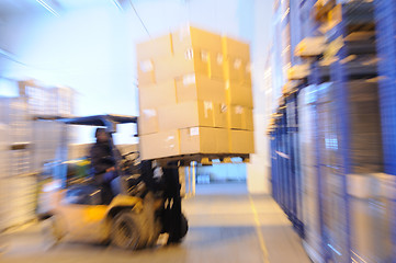 Image showing loader in a warehouse